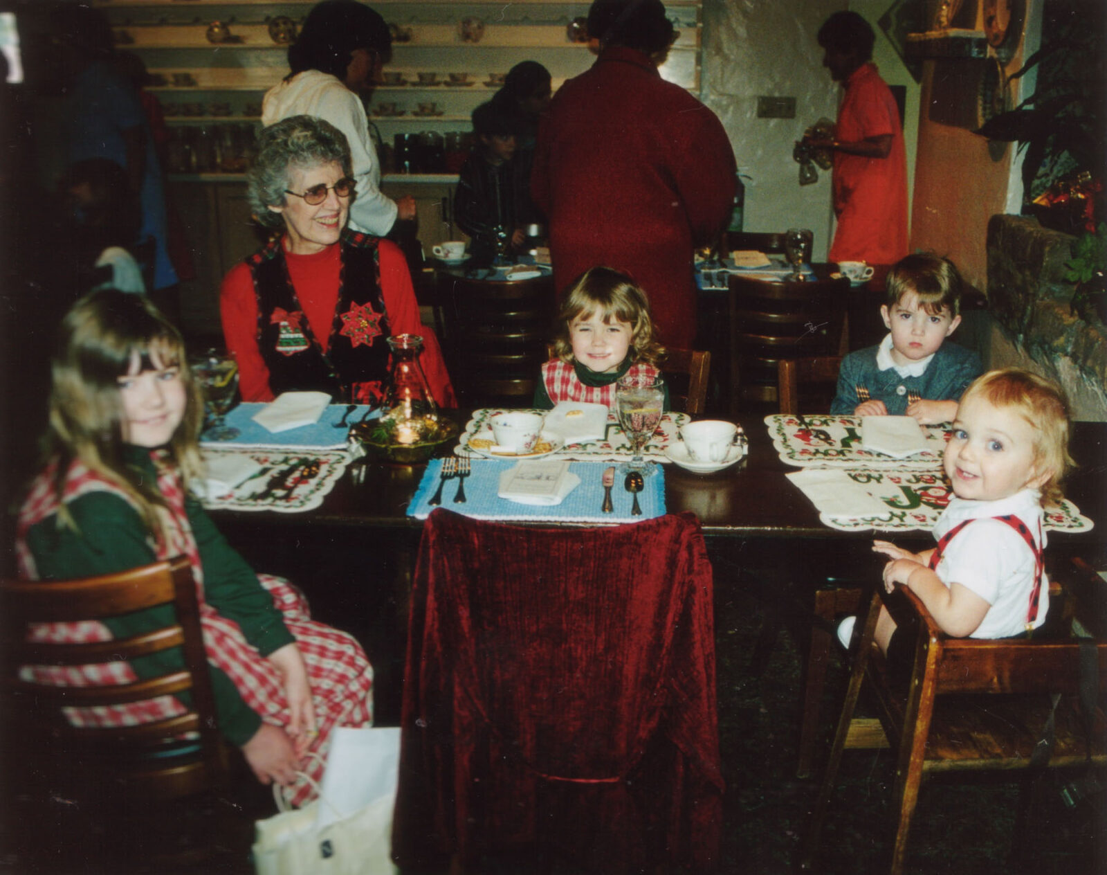Family enjoying lunch at Cafe Wisteria during the holidays — part of our annual Allied Arts tradition.