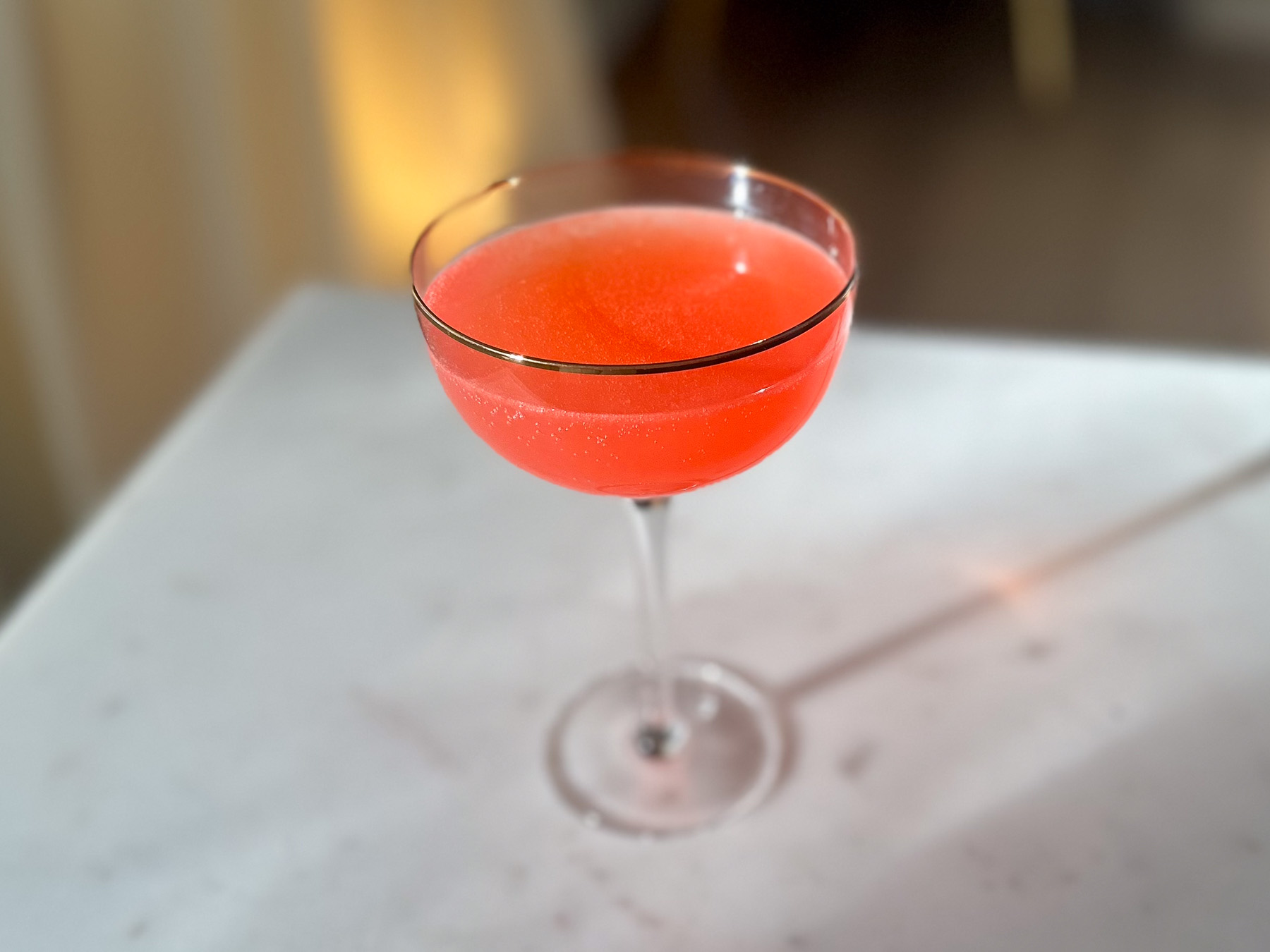 Pink Lady mocktail served in a clear coupe glass