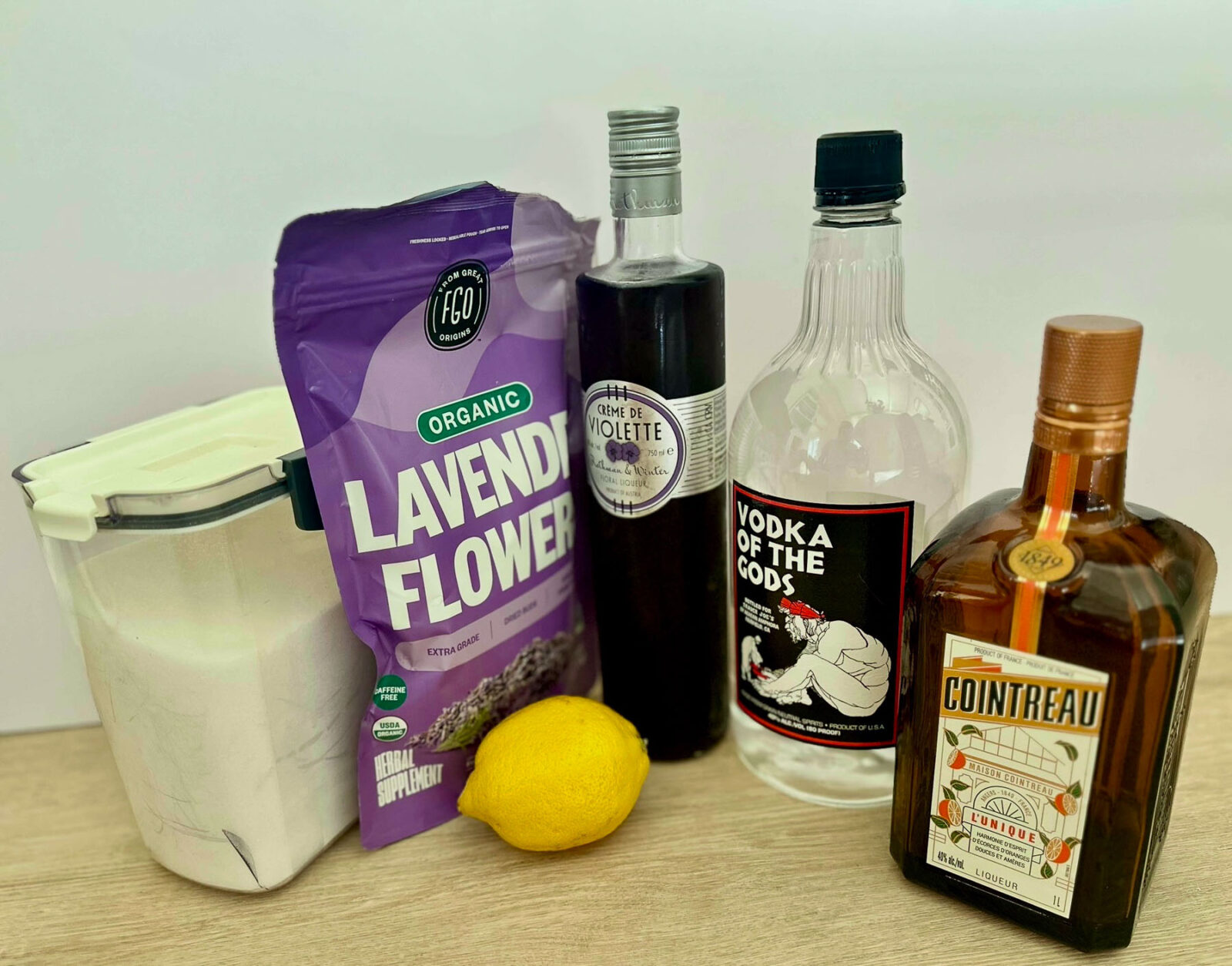 Lavender lemon drop martini ingredients including lavender, vodka, Cointreau, and lemon.